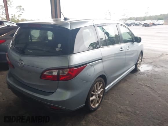 ✅ 2012 Mazda 5 Touring • VIN: JM1CW2CL1C0131939 • Lot: 43552511. Listed on IAAI with 171,138 mi. Free auction sales archive from the USA and detailed vehicle history report at DreamBid. Image 4.