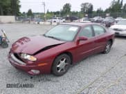 ✅ 2001 Oldsmobile Aurora • VIN: 1G3GS64C514259237 • Lot: 42797135. Wystawiony na IAAI z przebiegiem 60 761 mil. Bezpłatny archiwum sprzedaży aukcyjnych z USA i szczegółowy raport historii pojazdu na DreamBid. Zdjęcie 2.