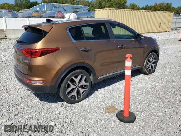 ✅ 2017 Kia Sportage SX Turbo • VIN: KNDPRCA60H7047170 • Lot: 71551675. Wystawiony na Copart z przebiegiem 128 514 mil. Bezpłatny archiwum sprzedaży aukcyjnych z USA i szczegółowy raport historii pojazdu na DreamBid. Zdjęcie 3.
