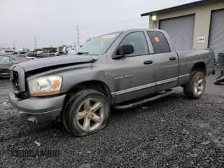 2006 Dodge 1500 Laramie with VIN 1D7HA18286S571086, listed as a Copart auction lot 84942424 with 303,762 mi miles and Salvage title. Bid and sale history available at DreamBid. Image 1.