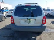 ✅ 2006 Mazda Tribute i • VIN: 4F2YZ02Z26KM38777 • Lot: 41673856. Listed on IAAI with 165,665 mi. Free auction sales archive from the USA and detailed vehicle history report at DreamBid. Image 17.