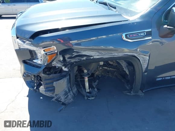 ✅ 2022 GMC Sierra 1500 SLT • VIN: 1GTU9DELONZ219903 • Lot: 40140320. Listed on IAAI with 57,019 mi. Free auction sales archive from the USA and detailed vehicle history report at DreamBid. Image 6.