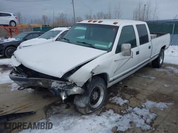 ✅ 2000 GMC Sierra 3500 • VIN: 1GTHC33J5YF404761 • Lot: 41269461. Listed on IAAI with 246,638 mi. Free auction sales archive from the USA and detailed vehicle history report at DreamBid. Image 2.