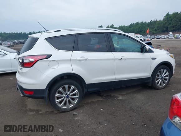 ✅ 2017 Ford Escape Titanium • VIN: 1FMCU9J95HUA35281 • Лот: 42839565. Опубликован ранее на IAAI с пробегом 152 415 миль. Бесплатный доступ к архиву аукционных продаж из США и подробный отчёт об истории автомобиля на DreamBid. Изображение 13.