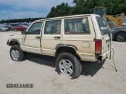✅ 1999 Jeep Cherokee Sport • VIN: 1J4FT68S0XL589158 • Lot: 71464305. Listed on Copart with Not provided. Free auction sales archive from the USA and detailed vehicle history report at DreamBid. Image 2.