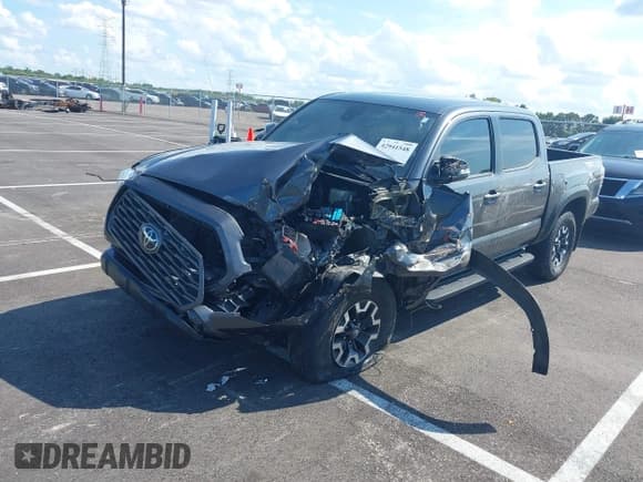 ✅ 2022 Toyota Tacoma SR • VIN: 3TMCZ5AN9NM519241 • Lot: 42941548. Listed on IAAI with 80,252 mi. Free auction sales archive from the USA and detailed vehicle history report at DreamBid. Image 17.