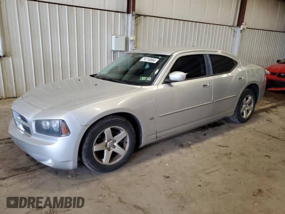 2010 Dodge Charger SXT с VIN 2B3CA3CV4AH231131, выставлен на аукционе Copart как лот 74116564 с пробегом Не указан миль и Списание • Salvage title. История ставок и продаж доступна на DreamBid. Изображение 1.
