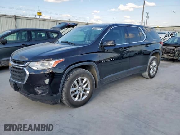 ✅ 2019 Chevrolet Traverse LS • VIN: 1GNERFKW5KJ106559 • Lot: 85687035. Wystawiony na Copart z przebiegiem 145 780 mil. Bezpłatny archiwum sprzedaży aukcyjnych z USA i szczegółowy raport historii pojazdu na DreamBid. Zdjęcie 1.