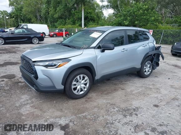 ✅ 2025 Toyota Corolla Cross L • VIN: 7MUAAAAG1SV122181 • Lot: 43226431. Listed on IAAI with 5,179 mi. Free auction sales archive from the USA and detailed vehicle history report at DreamBid. Image 2.