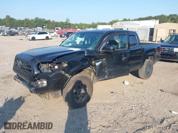 ✅ 2018 Toyota Tacoma SR • VIN: 5TFAX5GN5JX118987 • Лот: 43201622. Опубликован ранее на IAAI с пробегом 100 927 миль. Бесплатный доступ к архиву аукционных продаж из США и подробный отчёт об истории автомобиля на DreamBid. Изображение 2.