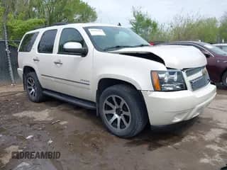 2011 Chevrolet Tahoe LTZ with VIN 1GNSKCE00BR237767, listed as a IAAI auction lot 42020189 with 256,822 mi miles and . Bid and sale history available at DreamBid. Image 1.