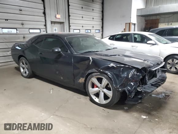 ✅ 2008 Dodge Challenger SRT-8 • VIN: 2B3LJ74W18H302861 • Lot: 82631424. Wystawiony na Copart z przebiegiem 86 743 mil. Bezpłatny archiwum sprzedaży aukcyjnych z USA i szczegółowy raport historii pojazdu na DreamBid. Zdjęcie 4.