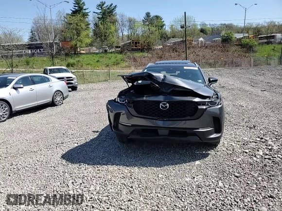 ✅ 2024 Mazda CX-50 S Premium • VIN: 7MMVABDMXRN173083 • Lot: 54336165. Listed on Copart with 11,410 mi. Free auction sales archive from the USA and detailed vehicle history report at DreamBid. Image 14.