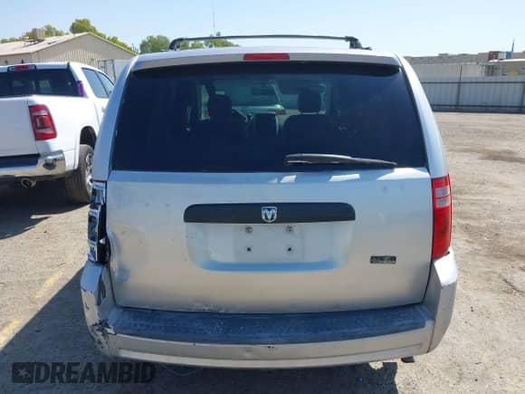 2010 Dodge Grand Caravan SE z VIN 2D4RN4DE2AR159523, wystawiony jako IAAI lot #43260507 z przebiegiem 144 851 mil mil oraz . Historia ofert i sprzedaży dostępna na DreamBid. Obrazek 16.