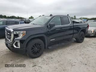 ✅ 2021 GMC Sierra 1500 • VIN: 1GTR9GEK6MZ311529 • Lot: 63425265. Listed on Copart with 82,699 mi. Free auction sales archive from the USA and detailed vehicle history report at DreamBid. Image 1.