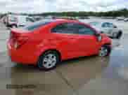 2014 Chevrolet Sonic LT z VIN 1G1JC5SH5E4196988, wystawiony jako Copart lot #69935555 z przebiegiem Nie podano mil oraz Szkoda całkowita • Salvage title. Historia ofert i sprzedaży dostępna na DreamBid. Obrazek 3.