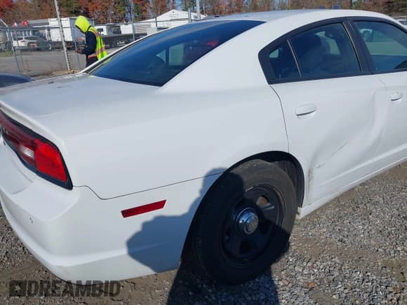 ✅ 2014 Dodge Charger Police • VIN: 2C3CDXAT0EH362405 • Lot: 43716806. Listed on IAAI with 118,544 mi. Free auction sales archive from the USA and detailed vehicle history report at DreamBid. Image 6.