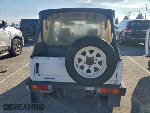 ✅ 1988 Suzuki Samurai • VIN: JS4JC51C2J4216375 • Lot: 93251155. Wystawiony na Copart z przebiegiem 47 665 mil. Bezpłatny archiwum sprzedaży aukcyjnych z USA i szczegółowy raport historii pojazdu na DreamBid. Zdjęcie 6.