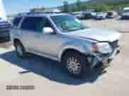 2010 Mercury Mariner Premier z VIN 4M2CN9HGXAKJ16116, wystawiony jako IAAI lot #43140056 z przebiegiem 194 370 mil mil oraz . Historia ofert i sprzedaży dostępna na DreamBid. Obrazek 1.