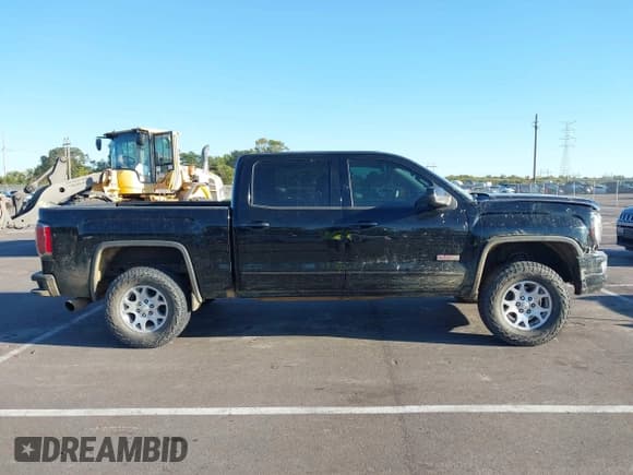 ✅ 2017 GMC Sierra 1500 SLT • VIN: 3GTU2NEJ9HG163733 • Lot: 43472082. Listed on IAAI with 142,828 mi. Free auction sales archive from the USA and detailed vehicle history report at DreamBid. Image 13.