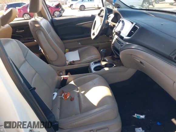 ✅ 2017 Honda Pilot EX-L • VIN: 5FNYF6H5XHB098584 • Lot: 43664045. Listed on IAAI with 119,767 mi. Free auction sales archive from the USA and detailed vehicle history report at DreamBid. Image 5.