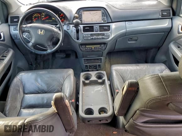 ✅ 2006 Honda Odyssey EX-L • VIN: 5FNRL38776B070297 • Лот: 95570655. Опубликован ранее на Copart с пробегом 124 763 миль. Бесплатный доступ к архиву аукционных продаж из США и подробный отчёт об истории автомобиля на DreamBid. Изображение 8.