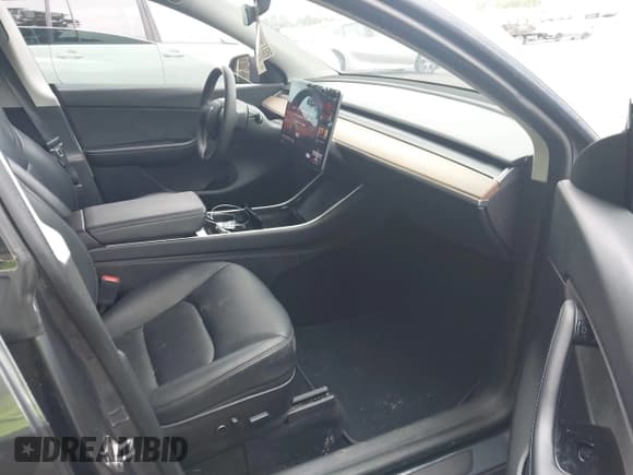 ✅ 2021 Tesla Model Y Standard Range • VIN: 5YJYGDED6MF105750 • Lot: 42855752. Listed on IAAI with 38,303 mi. Free auction sales archive from the USA and detailed vehicle history report at DreamBid. Image 5.