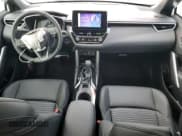 ✅ 2024 Toyota Corolla Cross Hybrid S • VIN: 7MUFBABG8RV054196 • Lot: 84668414. Listed on Copart with 9,252 mi. Free auction sales archive from the USA and detailed vehicle history report at DreamBid. Image 8.