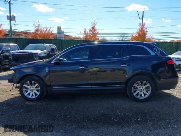 ✅ 2019 Lincoln MKT • VIN: 2LMHJ5NK1KBL00980 • Lot: 43603678. Listed on IAAI with 137,125 mi. Free auction sales archive from the USA and detailed vehicle history report at DreamBid. Image 15.