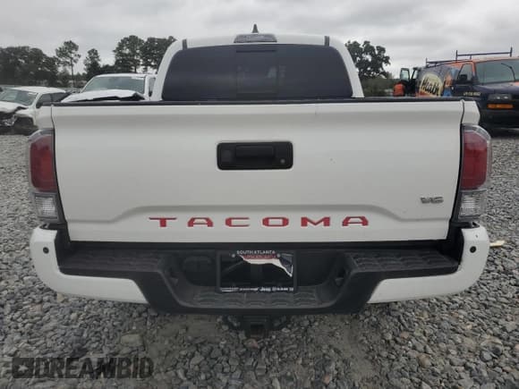 ✅ 2020 Toyota Tacoma TRD Sport • VIN: 3TMAZ5CNXLM139326 • Лот: 84818345. Опубликован ранее на Copart с пробегом 73 667 миль. Бесплатный доступ к архиву аукционных продаж из США и подробный отчёт об истории автомобиля на DreamBid. Изображение 6.