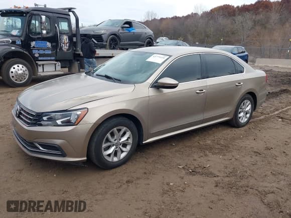 ✅ 2016 Volkswagen Passat S • VIN: 1VWAS7A30GC027303 • Lot: 43773231. Wystawiony na IAAI z przebiegiem 131 892 mil. Bezpłatny archiwum sprzedaży aukcyjnych z USA i szczegółowy raport historii pojazdu na DreamBid. Zdjęcie 18.