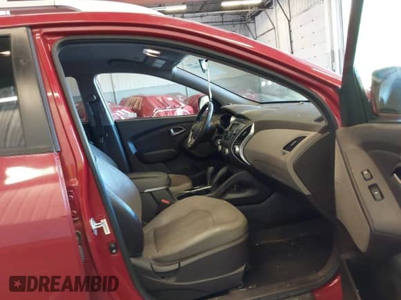 2010 Hyundai Tucson GLS with VIN KM8JUCAC5AU103469, listed as a IAAI auction lot 43394997 with 123,949 mi miles and . Bid and sale history available at DreamBid. Image 5.