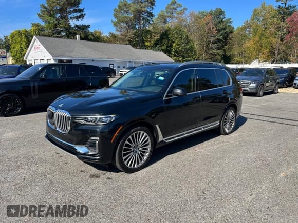 ✅ 2019 BMW X7 xDrive40i • VIN: 5UXCW2C57KL087006 • Лот: 91801395. Опубликован ранее на Copart с пробегом 95 958 миль. Бесплатный доступ к архиву аукционных продаж из США и подробный отчёт об истории автомобиля на DreamBid. Изображение 2.