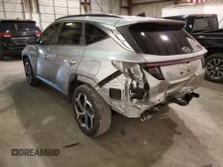 ✅ 2022 Hyundai Tucson SEL • VIN: 5NMJF3AE9NH050885 • Lot: 71323652. Wystawiony na Copart z przebiegiem 15 881 mil. Bezpłatny archiwum sprzedaży aukcyjnych z USA i szczegółowy raport historii pojazdu na DreamBid. Zdjęcie 2.