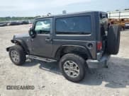 ✅ 2016 Jeep Wrangler Rubicon • VIN: 1C4BJWCGXGL190318 • Lot: 62747145. Listed on Copart with 51,406 mi. Free auction sales archive from the USA and detailed vehicle history report at DreamBid. Image 2.