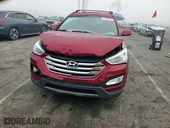 ✅ 2013 Hyundai Santa Fe Sport • VIN: 5XYZU3LB2DG122143 • Лот: 91450475. Опубликован ранее на Copart с пробегом 149 149 миль. Бесплатный доступ к архиву аукционных продаж из США и подробный отчёт об истории автомобиля на DreamBid. Изображение 14.