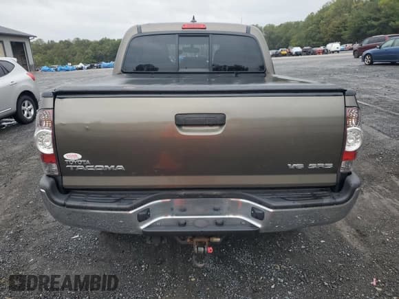 ✅ 2012 Toyota Tacoma • VIN: 5TFLU4EN2CX030707 • Lot: 85939585. Listed on Copart with 106,885 mi. Free auction sales archive from the USA and detailed vehicle history report at DreamBid. Image 6.