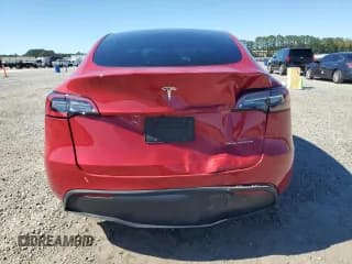 ✅ 2023 Tesla Model Y Long Range • VIN: 7SAYGDEE8PA092092 • Lot: 82406765. Wystawiony na Copart z przebiegiem 33 911 mil. Bezpłatny archiwum sprzedaży aukcyjnych z USA i szczegółowy raport historii pojazdu na DreamBid. Zdjęcie 6.
