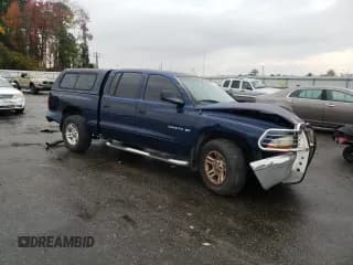✅ 2001 Dodge Dakota Sport • VIN: 1B7HL2AN41S258253 • Lot: 82574434. Wystawiony na Copart z przebiegiem Nie podano. Bezpłatny archiwum sprzedaży aukcyjnych z USA i szczegółowy raport historii pojazdu na DreamBid. Zdjęcie 4.