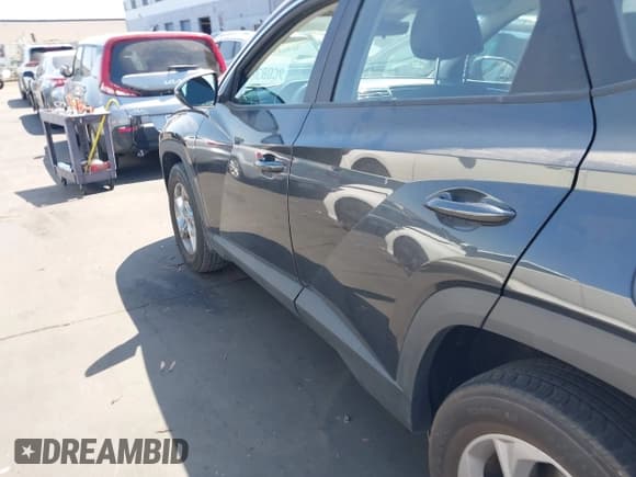 ✅ 2022 Hyundai Tucson SE • VIN: 5NMJACAEXNH146958 • Lot: 42484910. Wystawiony na IAAI z przebiegiem 48 103 mil. Bezpłatny archiwum sprzedaży aukcyjnych z USA i szczegółowy raport historii pojazdu na DreamBid. Zdjęcie 14.