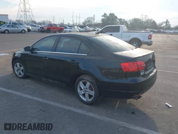 ✅ 2013 Volkswagen Jetta TDI w/Premium/Nav • VIN: 3VWLL7AJXDM356072 • Lot: 43804407. Listed on IAAI with 214,507 mi. Free auction sales archive from the USA and detailed vehicle history report at DreamBid. Image 3.