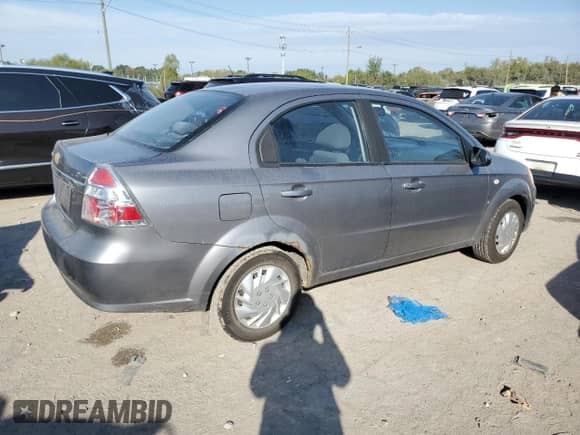2007 Chevrolet Aveo LS z VIN KL1TD56657B101227, wystawiony jako Copart lot #74333544 z przebiegiem 200 571 mil mil oraz Szkoda całkowita • Salvage title. Historia ofert i sprzedaży dostępna na DreamBid. Obrazek 3.