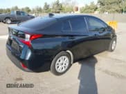 ✅ 2021 Toyota Prius LE • VIN: JTDKAMFUXM3147857 • Lot: 43635437. Wystawiony na IAAI z przebiegiem 105 003 mil. Bezpłatny archiwum sprzedaży aukcyjnych z USA i szczegółowy raport historii pojazdu na DreamBid. Zdjęcie 4.
