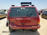 ✅ 1999 Jeep Cherokee Sport • VIN: 1J4FT68S5XL675839 • Lot: 65230005. Listed on Copart with 204,102 mi. Free auction sales archive from the USA and detailed vehicle history report at DreamBid. Image 6.