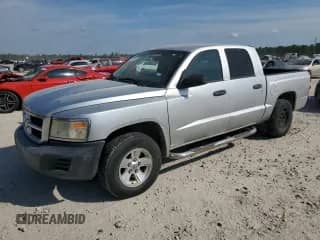 2008 Dodge Dakota SXT with VIN 1D7HE38K98S570063, listed as a Copart auction lot 87437695 with 163,645 mi miles and Clean title. Bid and sale history available at DreamBid. Image 1.