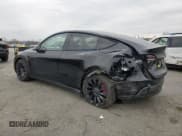 ✅ 2022 Tesla Model Y Performance • VIN: 7SAYGDEFXNF494575 • Лот: 92131305. Опубликован ранее на Copart с пробегом 25 889 миль. Бесплатный доступ к архиву аукционных продаж из США и подробный отчёт об истории автомобиля на DreamBid. Изображение 2.