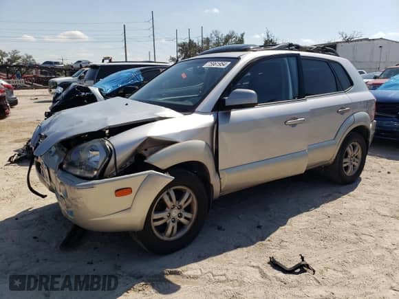 2006 Hyundai Tucson GLS z VIN KM8JN12DX6U393837, wystawiony jako Copart lot #75961954 z przebiegiem 215 906 mil mil oraz Szkoda całkowita • Salvage title. Historia ofert i sprzedaży dostępna na DreamBid. Obrazek 1.