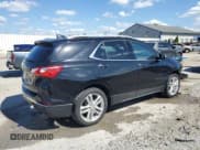 ✅ 2018 Chevrolet Equinox Premier • VIN: 2GNAXNEX6J6319115 • Лот: 84204425. Опубликован ранее на Copart с пробегом 104 712 миль. Бесплатный доступ к архиву аукционных продаж из США и подробный отчёт об истории автомобиля на DreamBid. Изображение 3.