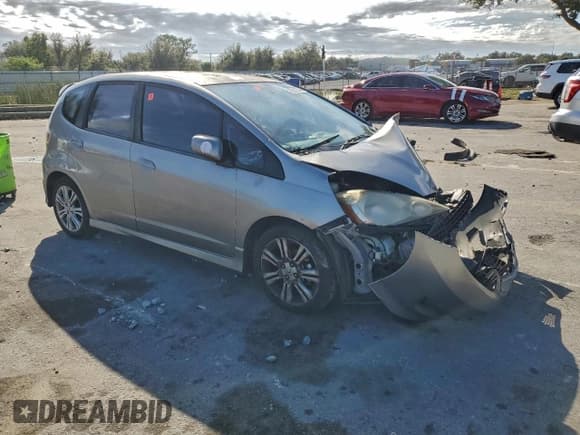 ✅ 2009 Honda Fit Sport • VIN: JHMGE88459C007414 • Lot: 96312345. Listed on Copart with Not provided. Free auction sales archive from the USA and detailed vehicle history report at DreamBid. Image 4.