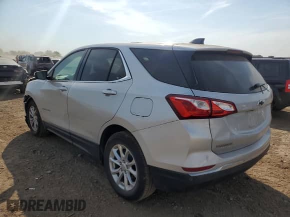 2018 Chevrolet Equinox LT с VIN 2GNAXJEV7J6263922, выставлен на аукционе Copart как лот 71521165 с пробегом 74 123 миль миль и Списание • Salvage title. История ставок и продаж доступна на DreamBid. Изображение 2.